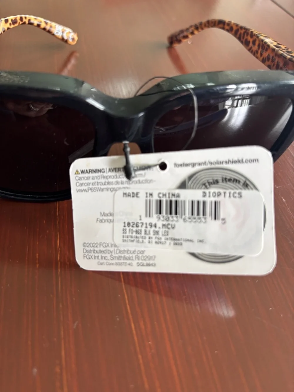 Foster Grant Solar Shield polarized,tortoise shell leopard arms,black frame/lens